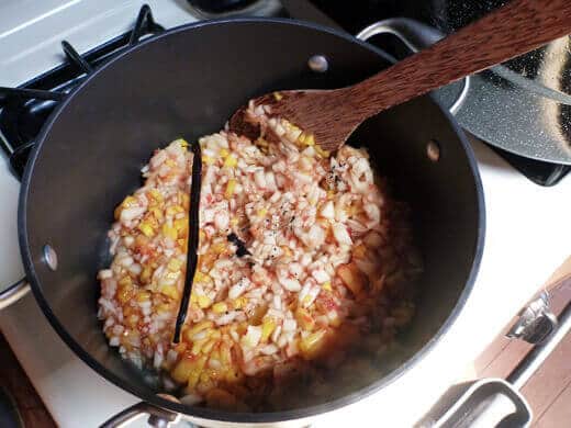 Combine peaches, vanilla seeds, scraped vanilla bean, and lemon juice in a large pot