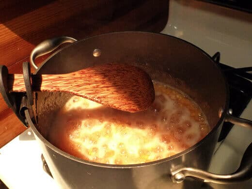 Boil vigorously until the mixture reaches a thick, jammy consistency