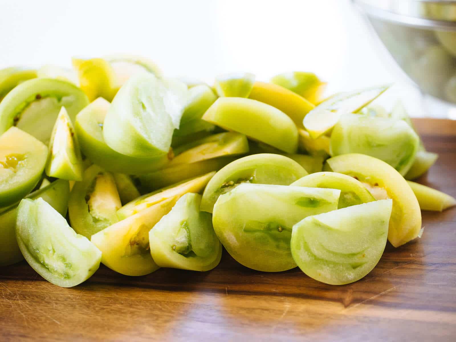 Pack jars tightly with green tomatoes