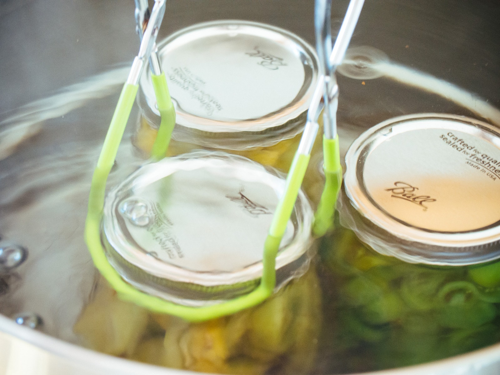 Process the jars in a boiling water bath