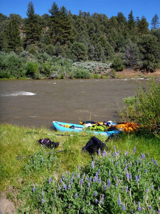 Pulling off on a sandy riverbank for lunch