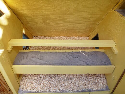 Pine shavings and diatomaceous earth inside the coop