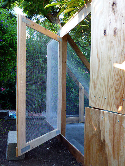 Main door assembled from scrap wood