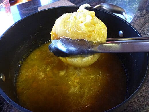 Use tongs to squeeze out natural pectin
