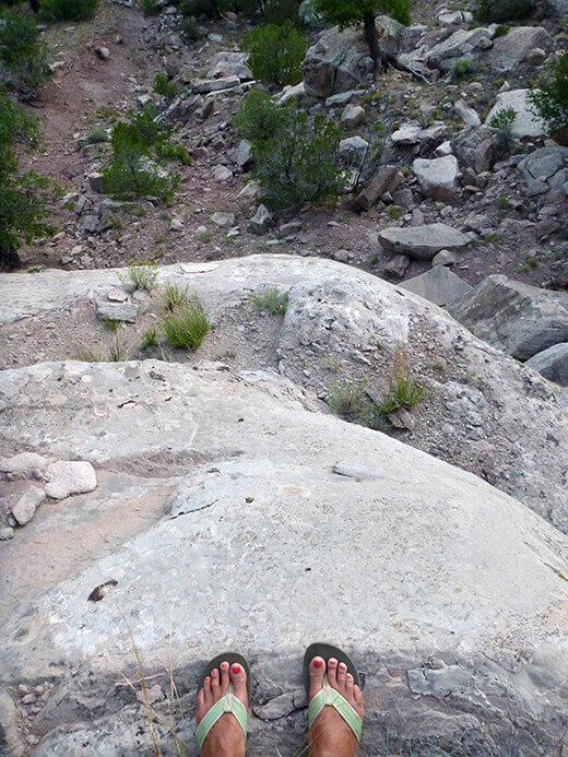 Scrambling up a cliff