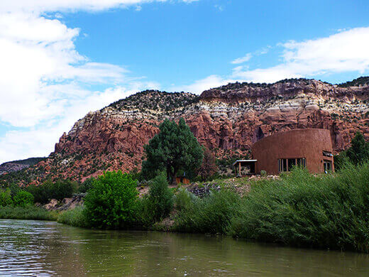 Adobe home on the Rio Chama riverbank