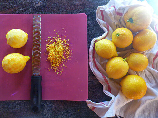 Wash, dry, and zest your lemons