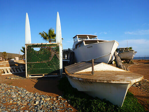 Glass bottle sculpture and cabin cruiser