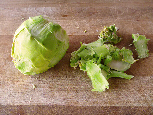Trim the tough bits off the kohlrabi bulb