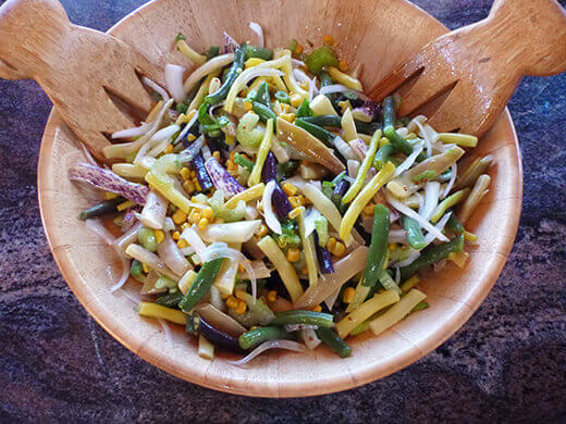 Toss the salad with dressing