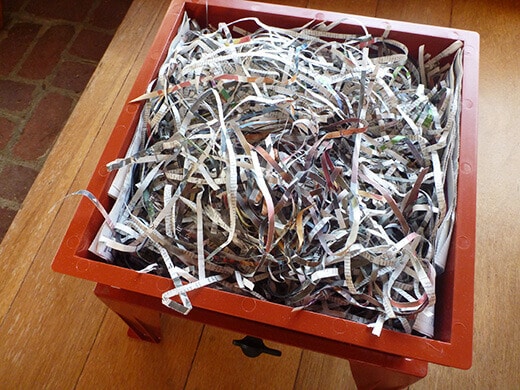 Add shredded paper on top
