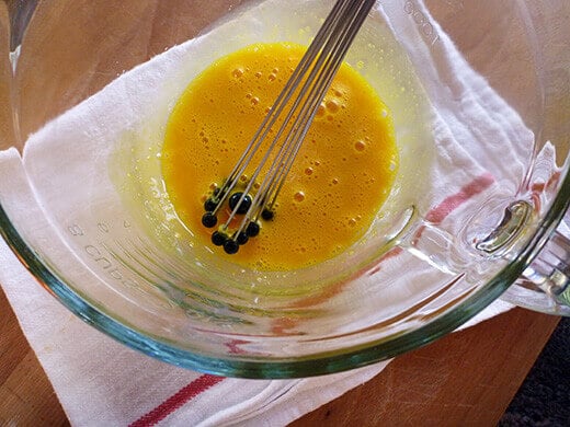 Whisk eggs together