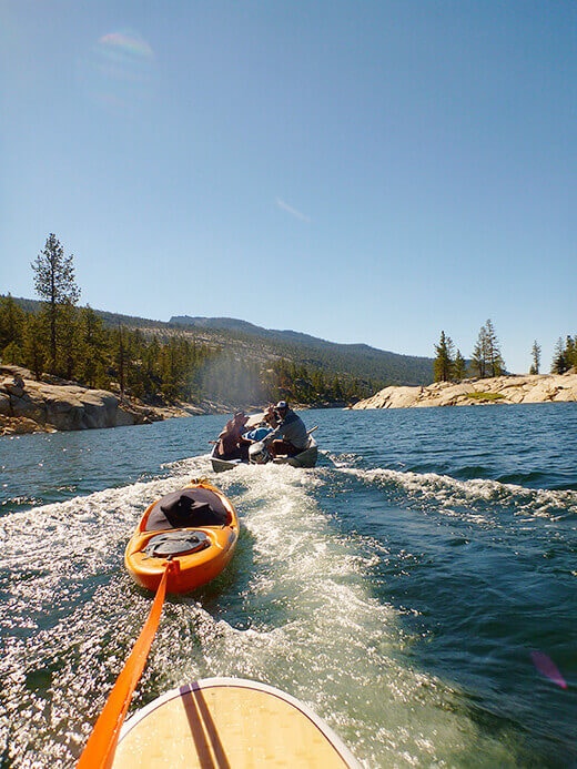 Riding the wake all the way across the lake