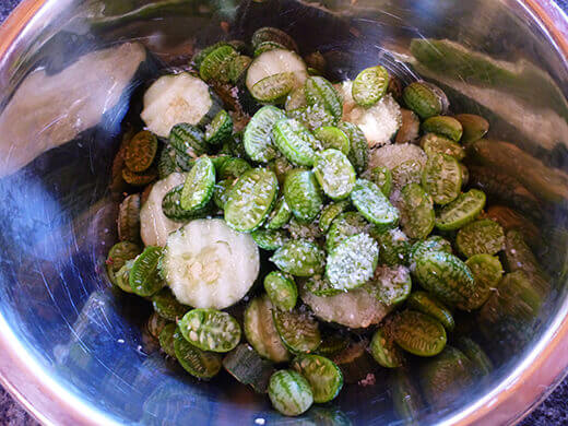 Liberally salt cucumbers to draw out moisture