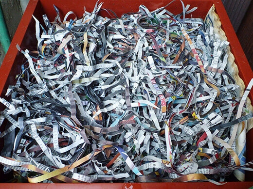 Add shredded paper to absorb excess moisture