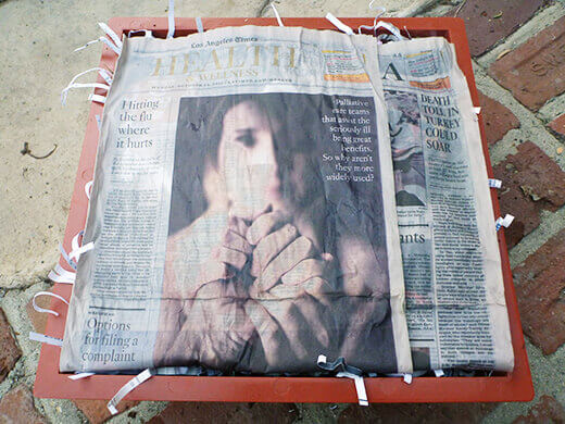 Lay a few sheets of moistened newspaper on top of everything
