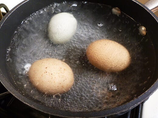 Lower heat and keep the eggs at a steady simmer for 10 minutes