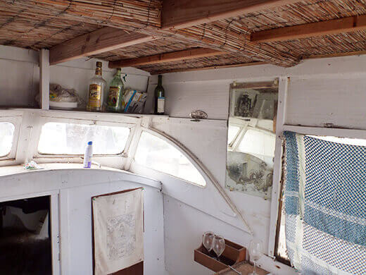 Before shot of interior of sitting room