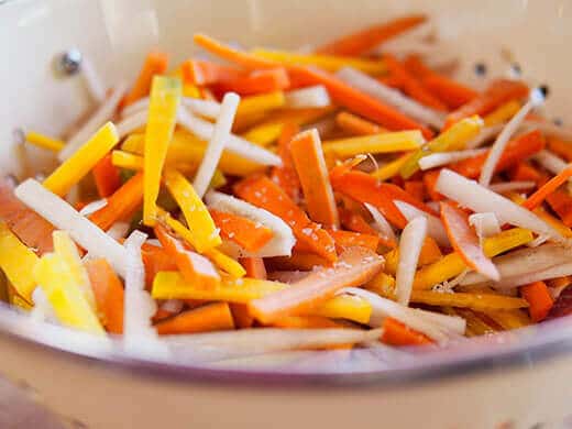 Liberally salt daikon and carrots to draw out moisture
