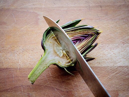 Slice the artichoke right above the choke
