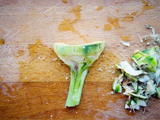 Slice off the outer leaves and peel the stem