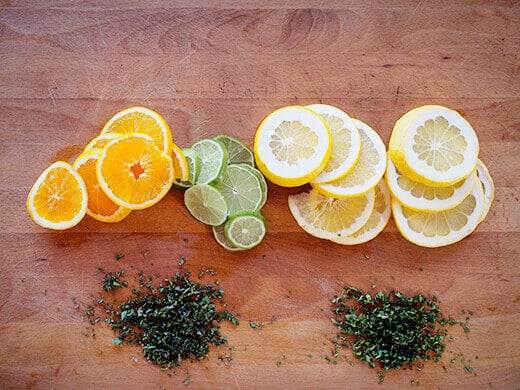 Sliced citrus and minced herbs