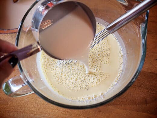 Whisk together milk mixture and egg yolks