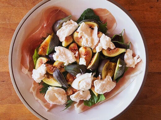 Artfully arrange your salad ingredients on a large plate