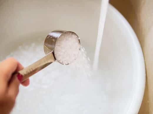 Dissolve Epsom salts in warm water