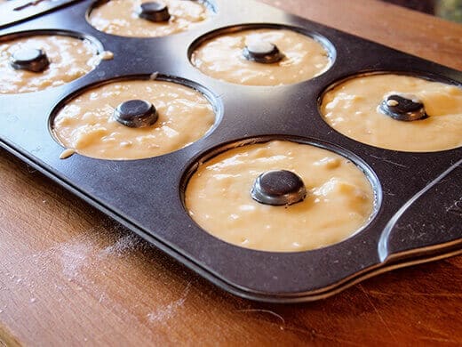 Fill each donut mold with batter