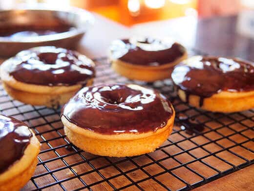 Chocolate hazelnut glaze on banana donuts