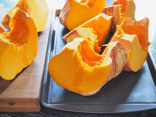 Arrange pumpkin wedges on baking sheet