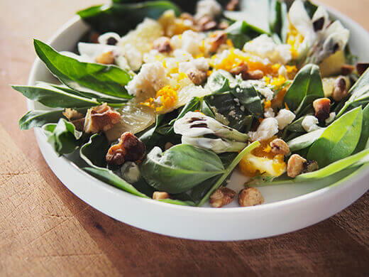 Seasonal salad with fava greens, fava flowers, and citrus