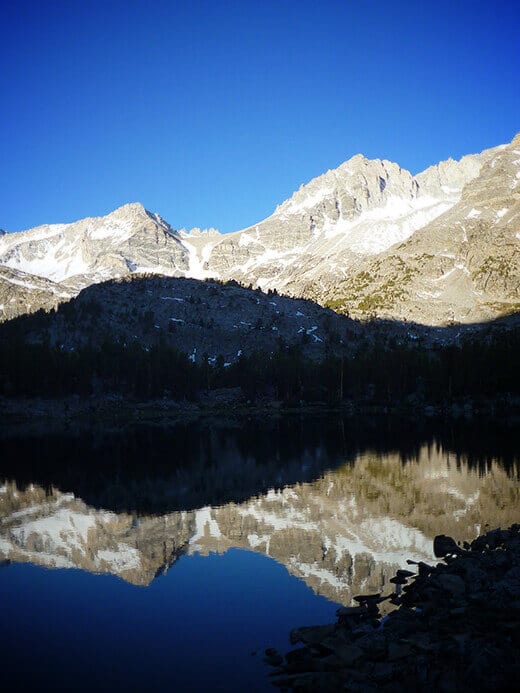 Sunrise reflection on Chickenfoot Lake