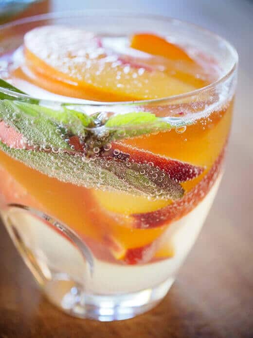 Moscato with fresh peaches, lemon and basil