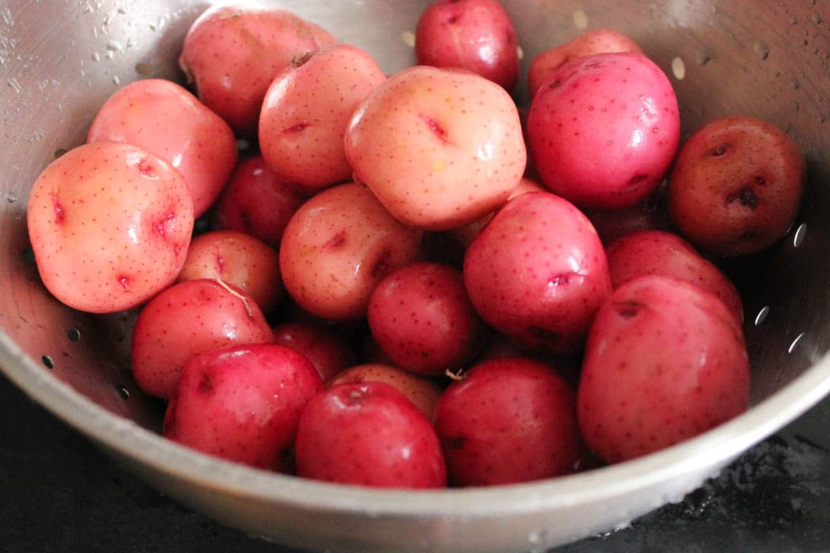 warm-roasted-potato-salad-with-pancetta-sun-dried-tomatoes-and-arugula-step-1