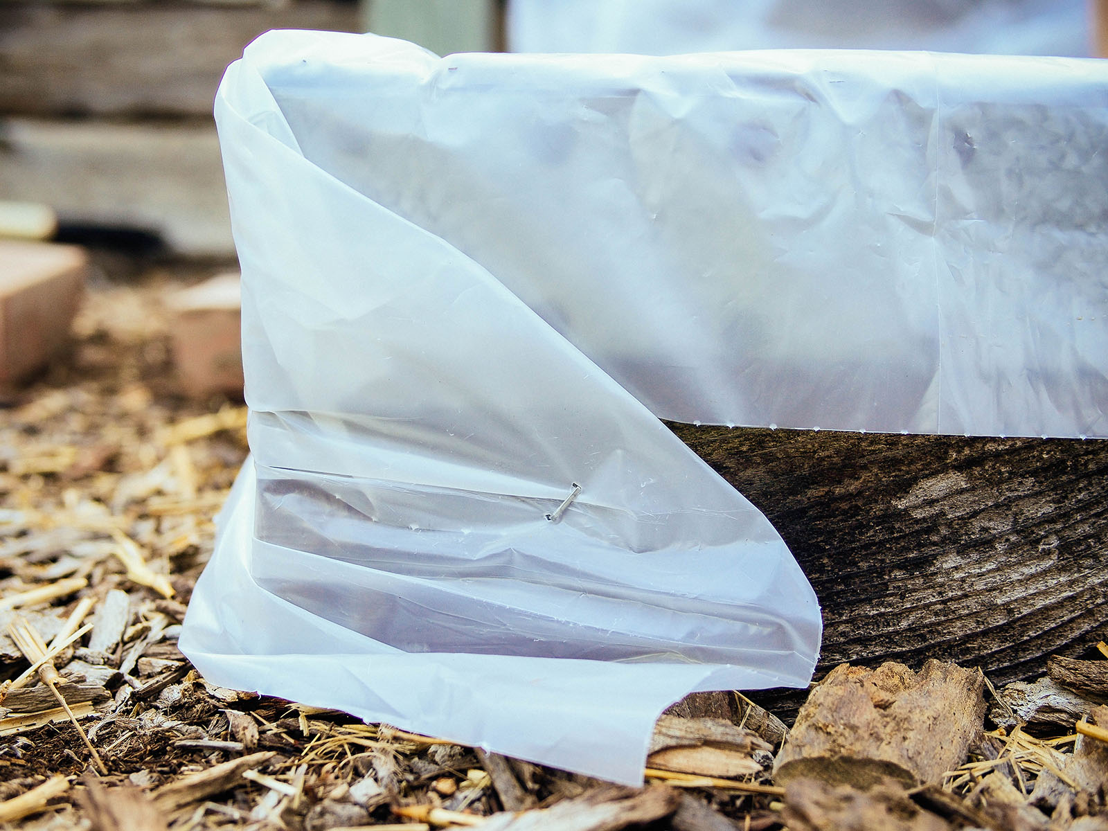 Wrap the plastic tightly around the bed