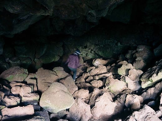 Hiking down into the lava cave