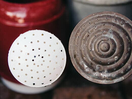 Comparison of watering cans