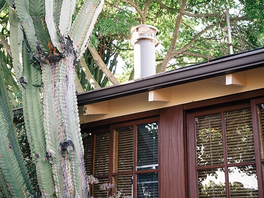 Mount the native bee house under an eave