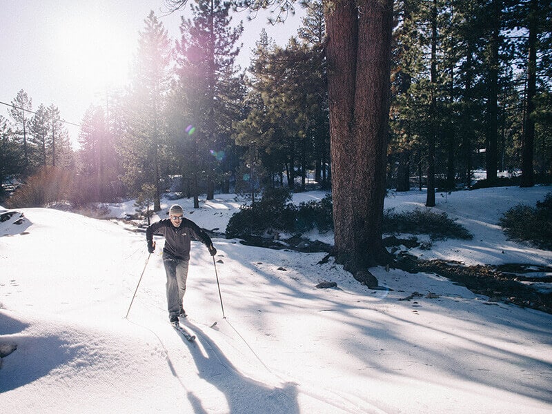 Cross-country skiing along a creek