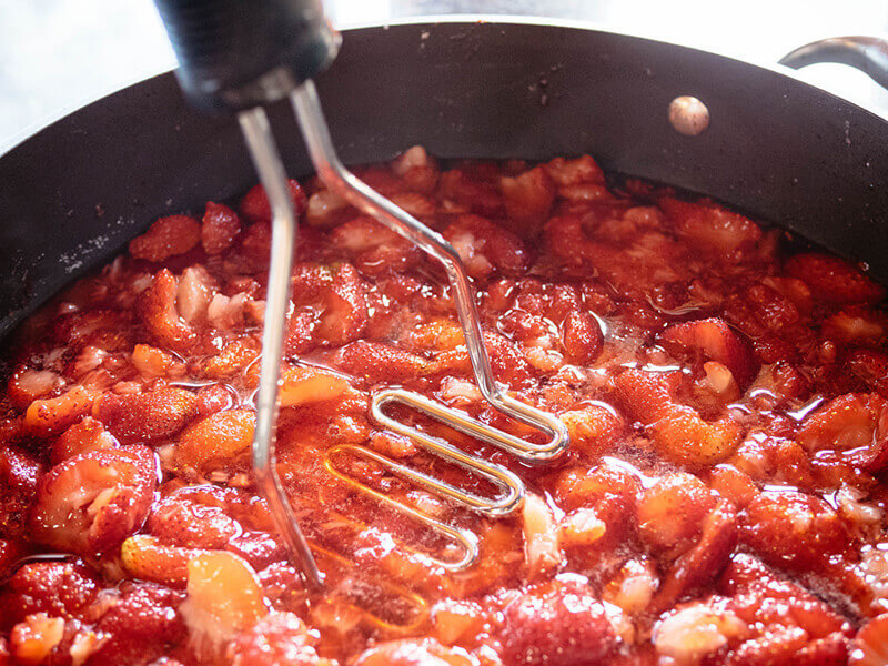 Crushing strawberries
