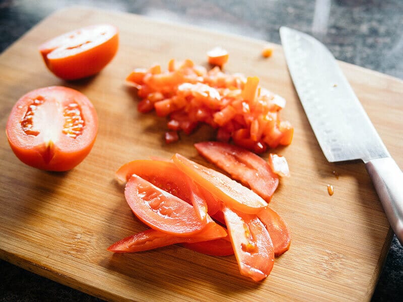 Finely chop tomatoes