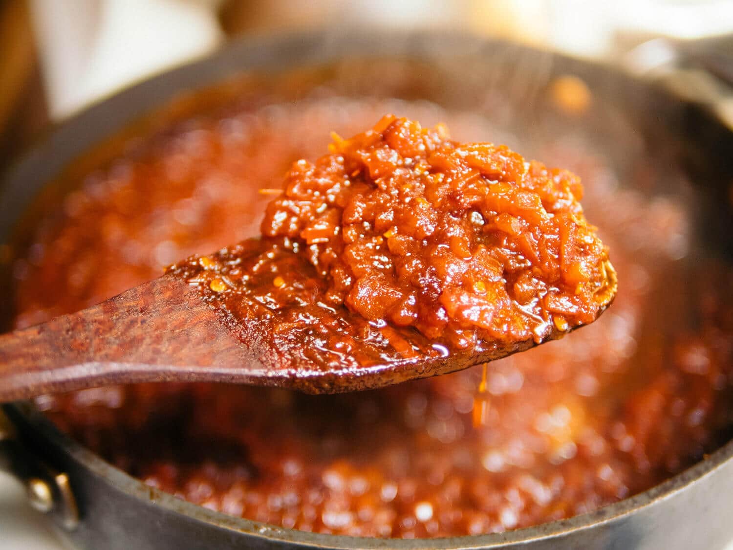 Simmer until the mixture is sticky and syrupy