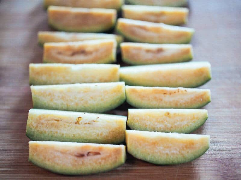 Trim and quarter the feijoas