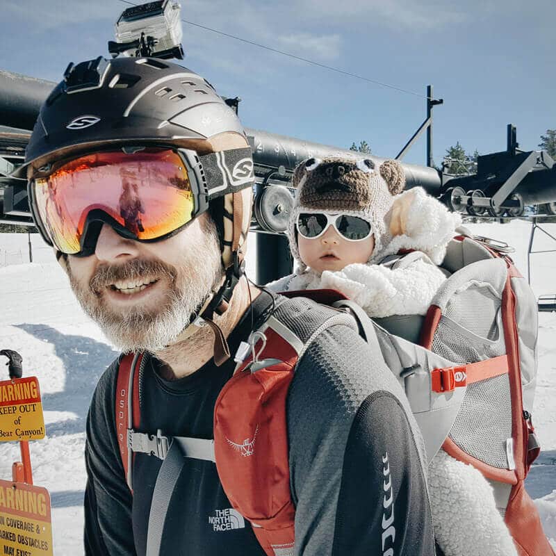 Dad and baby at the ski resort