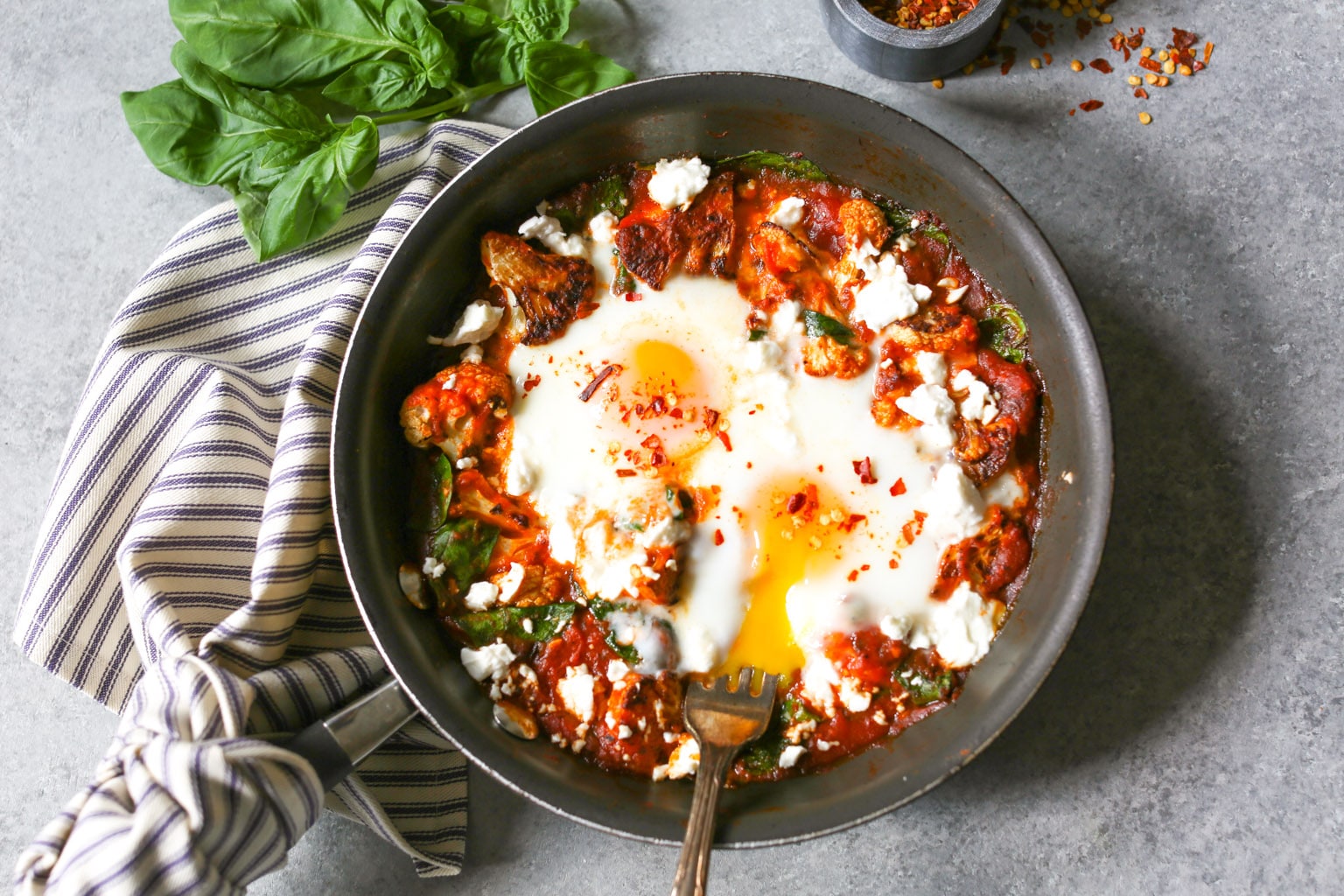 5-ingredient Skillet Eggs with Spinach and Roasted Cauliflower