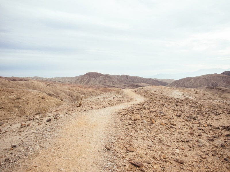 Topping out on a rounded ridge with views of Mecca Hills