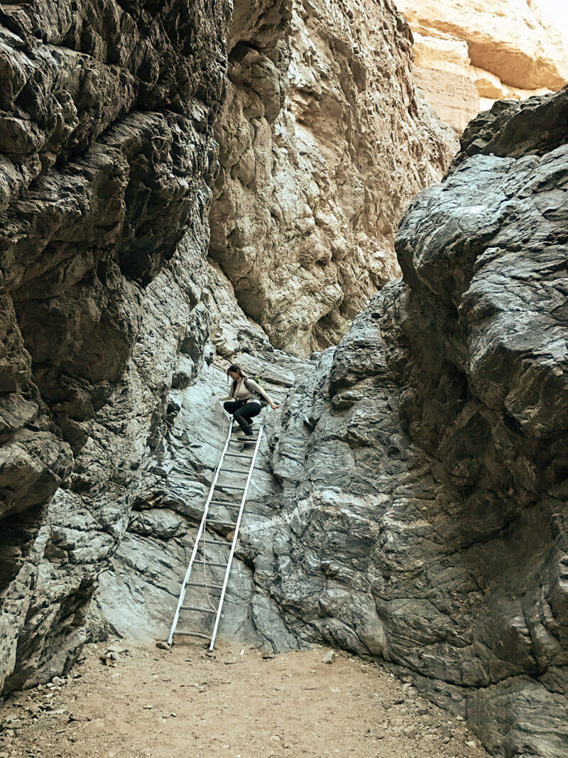 Climbing down a dry waterfall