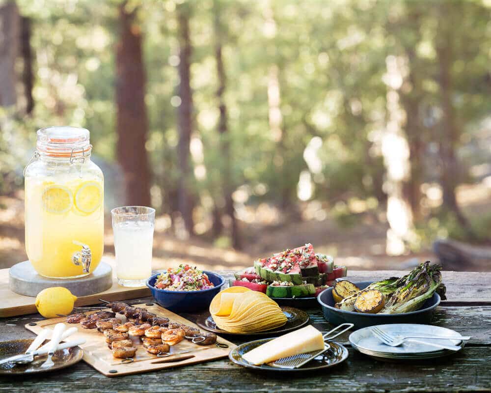 Grilled shrimp skewers, grilled watermelon, grilled romaine, and homemade spiked lemonade